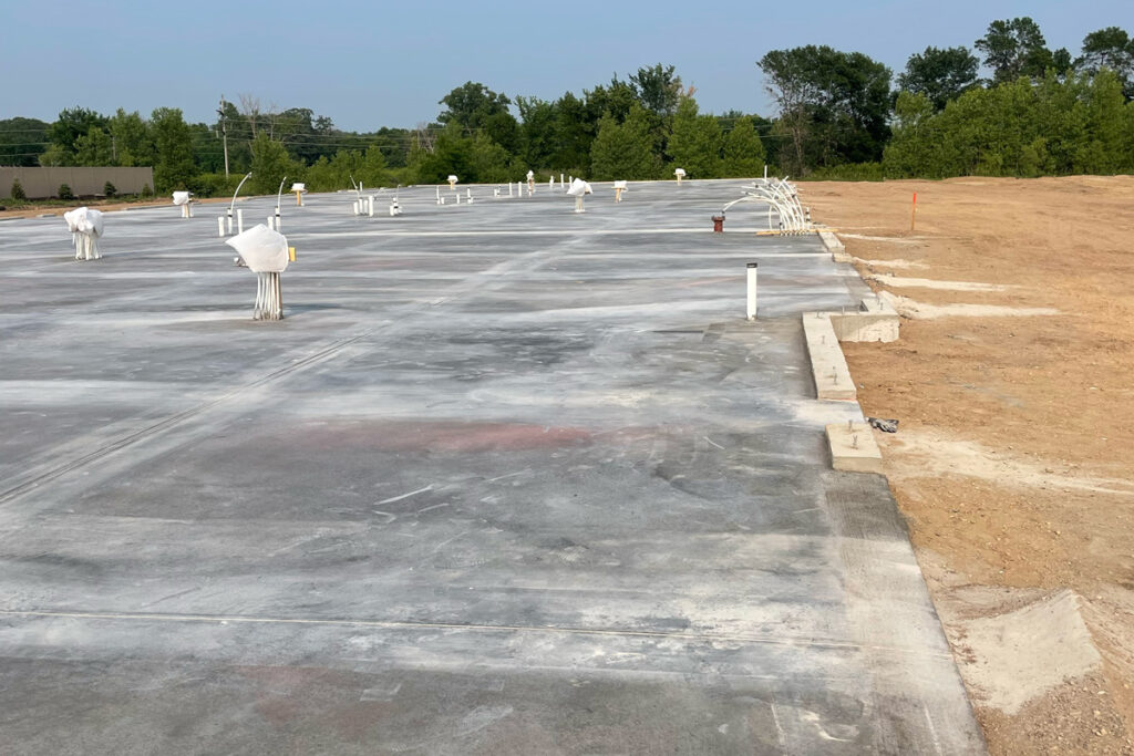 A concrete pad for a large building.