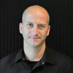 A head shot photo of Jeremy Scheuble.