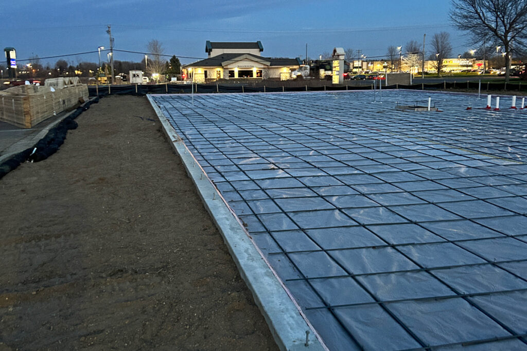 A construction site readied for a concrete slab pour.